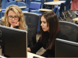 girls who code help student at fiu photo