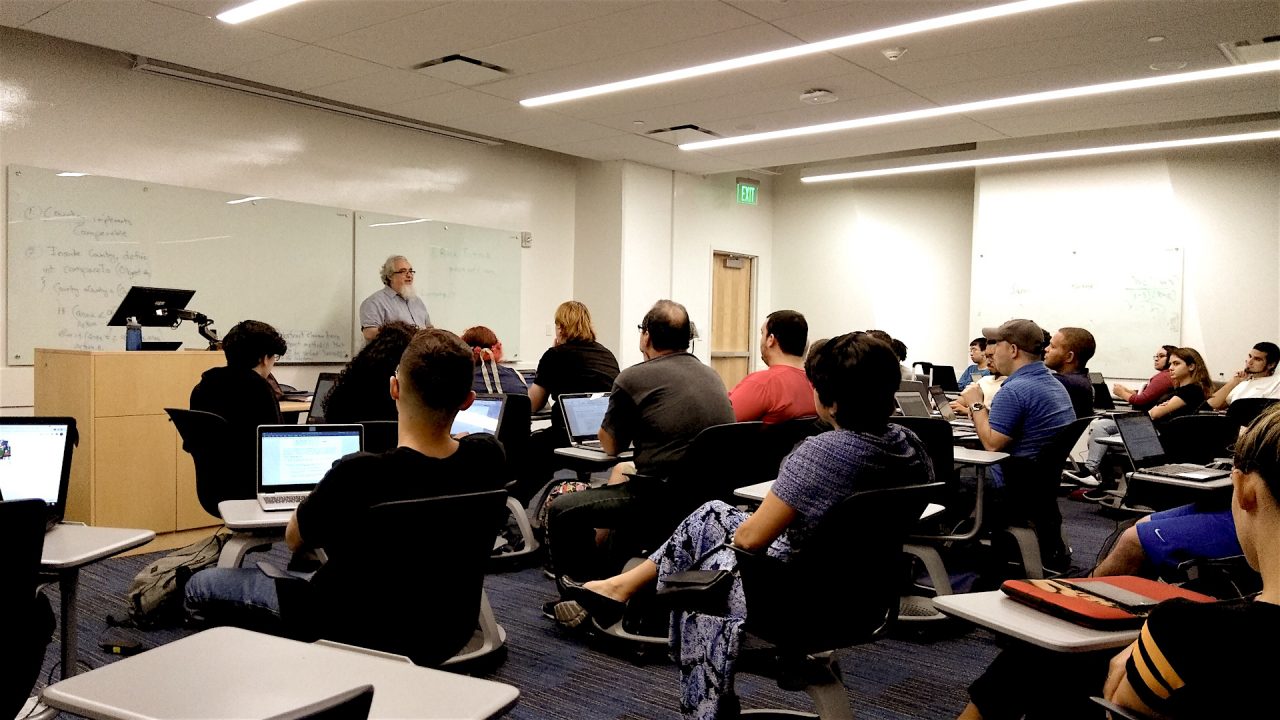 Photo of Rick Tuttle talking to a class.