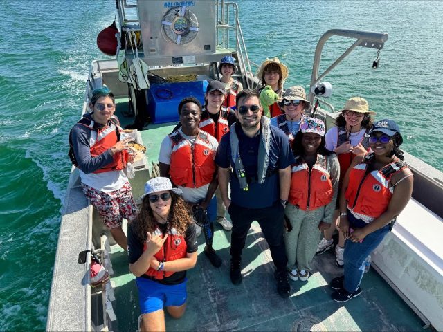 Students aboard a research vessel.